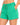 Green sweat shorts close up with side pocket and curved hem