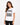 A woman wearing a white t-shirt featuring a zebra print design and stylish text in a square graphic.