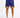 Navy blue shorts with a colorful geometric pattern at the hem, paired with white sneakers.