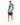 A man stands wearing a colorful short-sleeve shirt with a tropical design and matching blue shorts.
