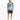 A man stands wearing a colorful short-sleeve shirt with a tropical design and matching shorts, paired with white snea...