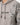 A light gray sweatshirt featuring a hood, decorative leaf patterns, and bold text on the front.