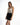 A model poses in a light tie-dye tank top and high-waisted black denim shorts against a white background.