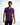 A man wearing a fitted purple t-shirt with motivational text printed across the chest, paired with black jeans.