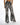 Rear view of Marlee high-waisted wide leg pants in a bold black and white geometric tribal print.