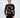 A model wearing a black long-sleeve shirt featuring colorful graphic designs and playful text elements.