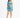 A model poses in a vibrant blue and teal one-shoulder dress with a fitted silhouette and ruched detailing.