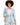 Light blue blazer with a belted waist, paired with matching shorts and a white crop top, worn by a model with curly h...