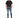 A man stands wearing a black oversized t-shirt, distressed blue jeans, and black sneakers.