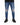 Blue jeans with distressed detailing and rips, paired with black sneakers.