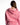 A woman with long hair is wearing a pink hoodie, showcasing the back design and relaxed fit.