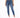 A model wearing fitted blue jeans paired with a white cropped top and white sneakers, standing against a plain backgr...
