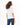 Back view of the More Love white graphic t-shirt in a premium streetwear fit on a model with dark denim jeans.