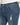 Close-up of blue denim jeans featuring a distressed patch and classic five-pocket design with contrasting stitching.