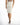 Back view of the Eve White Pencil Skirt, a high-waisted midi skirt with a back zipper and slit for a curve-hugging fit.