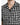 Short-sleeve shirt featuring a black and white grid pattern with a classic collar and button closure.