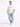 Model wearing blue washed jogger jeans with a white t-shirt, showcasing a casual look.
