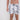 Men's Jayden floral swim trunks in white and grey with a black drawstring waist, perfect for summer beachwear.