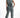 Back view of Faye Denim Jumpsuit in blue wash utility style featuring an elastic waist, cargo pockets, and tapered legs.
