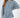 Model wearing Saylor blue oversized distressed cable knit sweater with a trendy, relaxed fit for a Gen Z aesthetic.