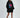 Model in an oversized black hoodie with a pink lips graphic print, ruched sleeves, and front pocket.