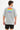 Back view of grey oversized streetwear shirt with rainbow popit graphic and inspirational white text on carbon fabric.