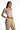 Model in Bailey lavender ribbed crop tank top with spaghetti straps and tan trousers against a white background.