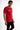 Man in red Revolution Graphic Tee by Carbon. Urban streetwear t-shirt with embossed chest text and side graphic detail.
