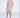 Men's blue and white striped Tim Swimwear trunks with drawstring waist on model, styled with white slides.