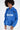 Model in oversized blue ADOREYOU hoodie with distressed cut-outs and white logo, a streetwear staple for Gen Z fashion.