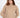 Serena off-white cable knit sweater featuring an oversized fit, ribbed turtleneck, and drop shoulders on a female model.