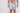 Men wearing Jayden patterned swim trunks with a black floral print, grey elastic waistband, and drawstring on white.