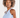 Model wearing the Tori Top, a light blue ribbed knit halter top with hardware details and a cropped fit.