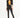 Model in a yellow Essential Ribbed Bralette Top with a black cropped blazer and high-waisted split-hem trousers.