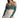 Model wearing Carbon Leyla Crop Top in teal with thin straps, cold shoulder sleeves, and a white pleated skirt.