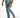 Men's Carbon Kolton light blue slim fit streetwear jeans with distressed knee detail and white sneakers.