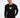 Model wearing Keep On Moving black long sleeve streetwear graphic tee with yellow chest print and white jeans.