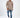 Man wearing the tan Sean Textured Knit Streetwear Sweater with distressed details, blue jeans, and white sneakers.