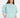 Model in teal More and Less cropped sweatshirt with embossed text and puff sleeves against a white background.