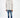 Man wearing Tristan Blue Washed Super Skinny Jeans in a slim fit denim style with a distressed cream sweater.
