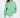 Model wearing the Eve Top, an oversized light green crewneck sweatshirt with 'More and Less' embroidered on the chest.