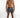 Man in Niko black and white striped swim trunks with white drawstring, Carbon brand slides, and poolside summer style.