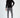 Model in RAFAEL super skinny fit grey jeans with knee rips and carbon wash, styled with a black turtleneck and boots.