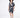 Man in Ryland two-piece matching set with black short-sleeve button-down shirt and shorts in abstract streetwear print.