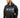Model wearing a black oversized streetwear hoodie with blue embroidered 'COOL' and white 'HERITAGE' graphic.