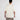 Back view of a man wearing an oversized cream Fine Arts graphic streetwear shirt with relaxed fit cotton sleeves.
