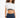 Smiling woman wearing a white cropped t-shirt with a black striped hem and blue denim jeans.