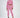 Pink Eyes Graphic Print 2-piece streetwear set with cropped long-sleeve top and cutout jogger pants on model.