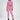 Pink Eyes Graphic Print 2-piece streetwear set with cropped long-sleeve top and cutout jogger pants on model.