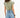 Back view of Gravity Grey padded muscle tee with structured shoulders and raw-hem denim shorts for a streetwear aesthetic.